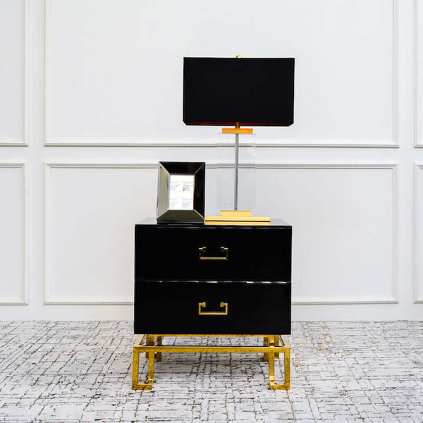 Lux up your end table with strong black and gold elements.