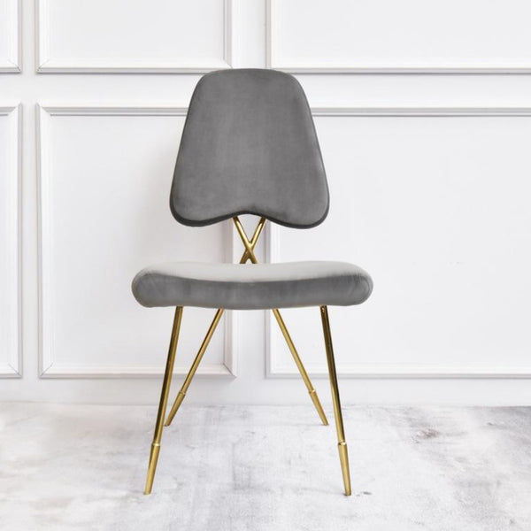 Inspired by Jonathan Adler, the Artus Gold Chair is truly a gorgeous addition for a modern home. 