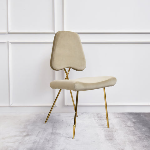 Artus Gold dining Chair in smooth Champagne Velvet, sleek and thin for smaller dining room space.