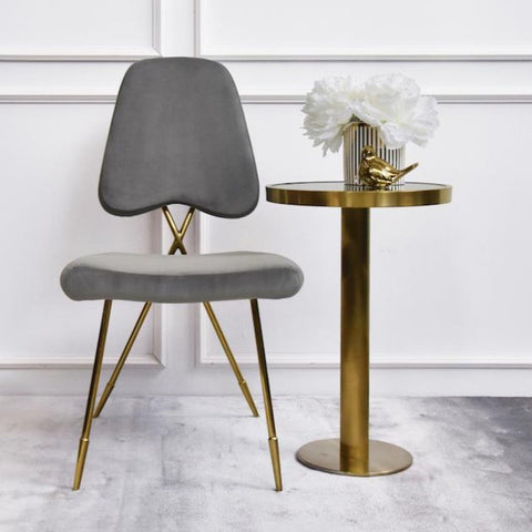 Artus Gold Chair, style as an accent chair and pair this with the Vis-a-Vis side table for a cosy reading corner.