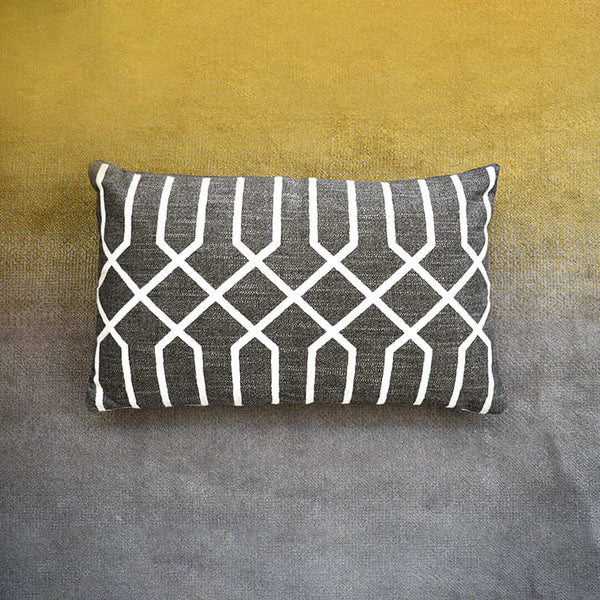Refresh your cushions with linen boudoir pillows for a modern geometric look.