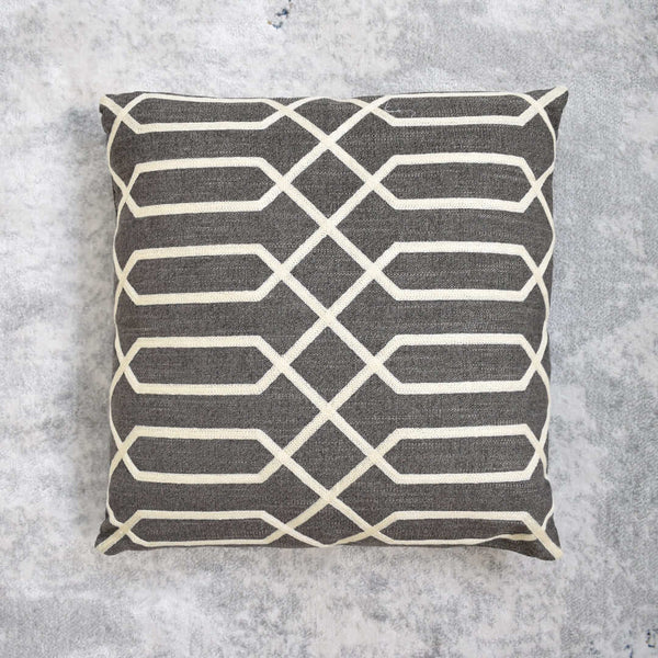 Geometric Atticus square embroidery cushion in Brown.