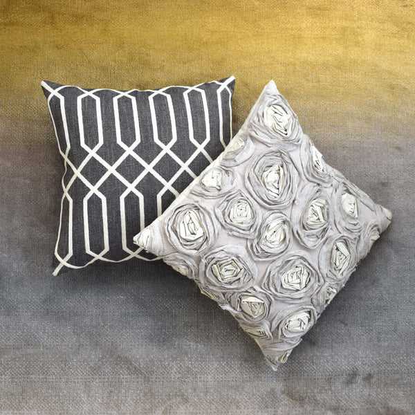 Top view of Atticus Grey with Gold Beige embroidery detailing and Finley Rose Square Cushion.