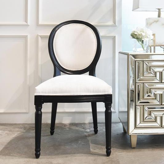 An elegant and neoclassical dining chair, inspired by Greek and Roman classicism, hand crafted by artisans. 