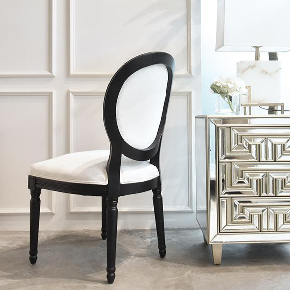 Black and white King louis accent chair is great as a dresser chair, dining chair or study chair. It is displayed at Finn Avenue showroom in Singapore.