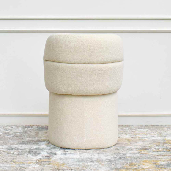 Back view of silhouette curves of the Bonbon Boucle chair.