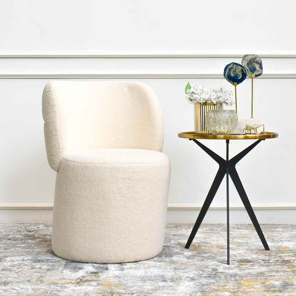 Pair this statement piece Bonbon accent chair with the Dante side table for a classic and fun look.