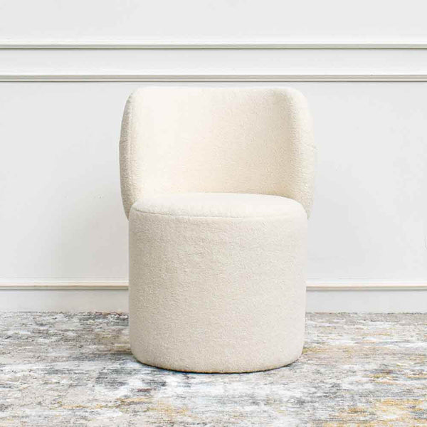 Single front view of ivory boucle petite chair.