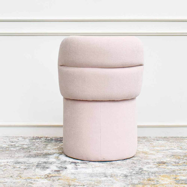 Back view of vanity chair in pink boucle fabric.