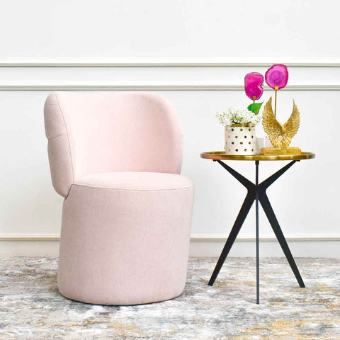 Defined by its petite appearance, Bonbon Boucle Blush Pink Accent Chair embodies an inviting curved silhouette that envelops your back with smooth lines and curved back support. Complemented by boucle upholstery, it's the perfect hybrid of style and comfort albeit its petite size.