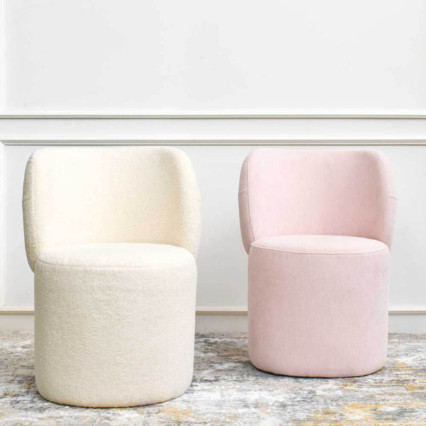 Front view of Bonbon accent chairs in boucle trending fabric.