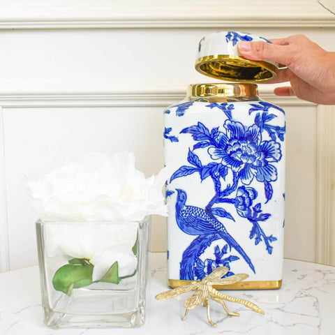 Chinoiserie Ceramic Lidded Jar, Blue White. Hand-painted decorative birds and floral patterns in varying hues of blue. Metallic lined.