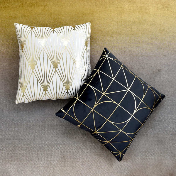 White velvet Empire old geometric cushion against Black Velvet Chrysler geometric cushion.