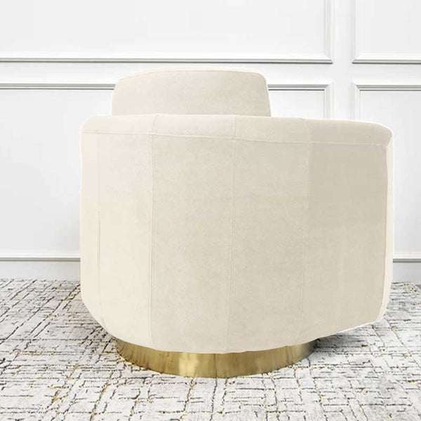 Stainless steel brushed gold base on the Clyde armchair in Ivory velvet.