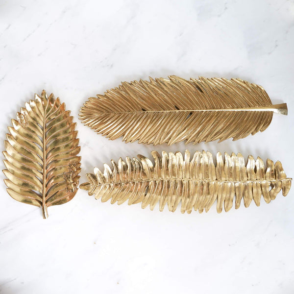 Textured leaf tray designs in gold, for coffee table or dining table decor.