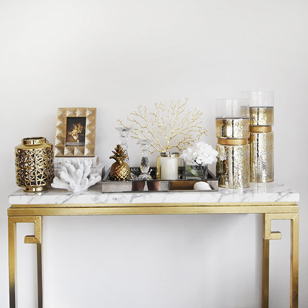 Console table decor ideas for a a plain narrow walkway or entryway.