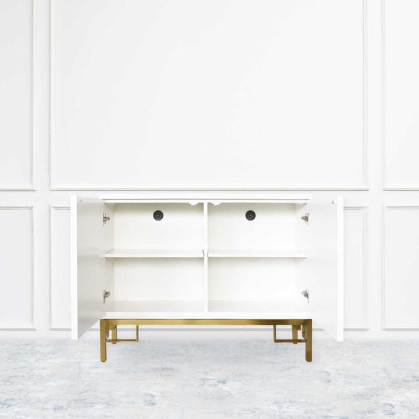 The Divine 2 Door Cabinet has a spacious storage space with two grommet holes to hide wires easily.