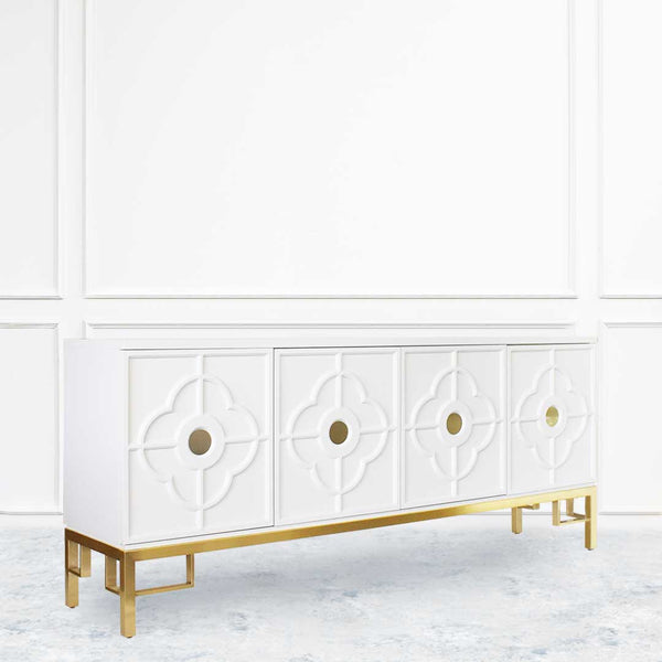 Side view of Divine 4 door Cabinet, Brushed steel leg frame with simplistic greek keys gold legs for a hint of Modern and Mid-century design.