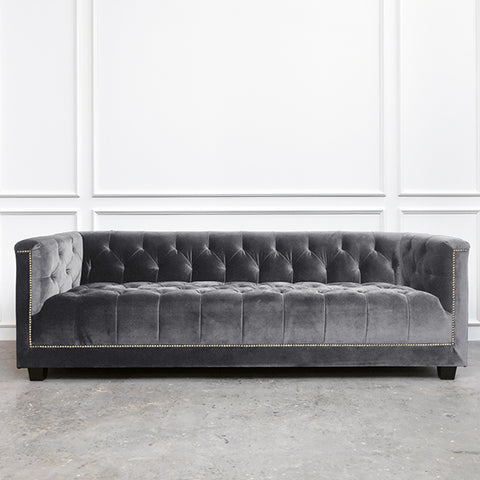 Chesterfield sofa that is tailor-made and customized into grey velvet from a variety of fabrics to choose from.