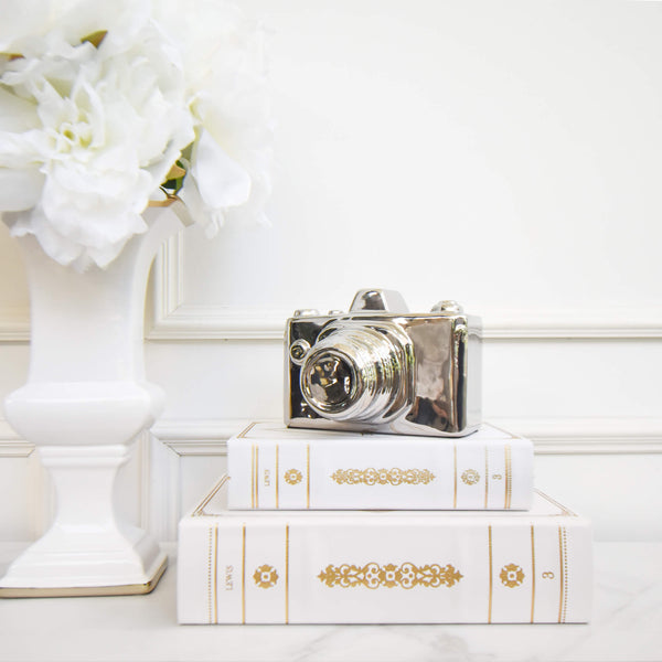 Stacked Large and Small Langford Faux Leather Book Box for added dimension for smaller decor items. 