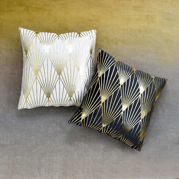Modern art deco styled velvet cushions, available in ivory and in black.