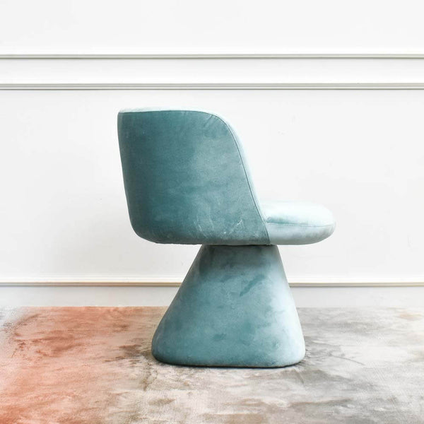 This Escargot Mint Armchair is perfect tucked in a relaxing corner with its petite size. 