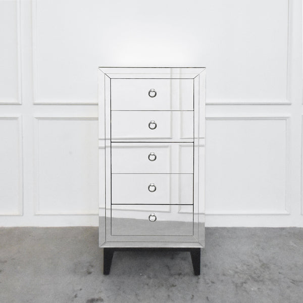 Etienne Mirrored Chest of Drawers is made using hand-crafted mirrors. in a sleek and minimalistic style, This Tall Boy Dresser is one-of-a-kind-cabinet.