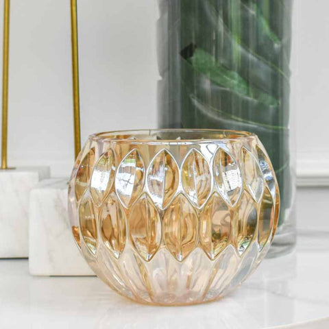 The Etta glass candle holder is a Statement piece to add warm ambiance to interior space. Available in 3 colours.  