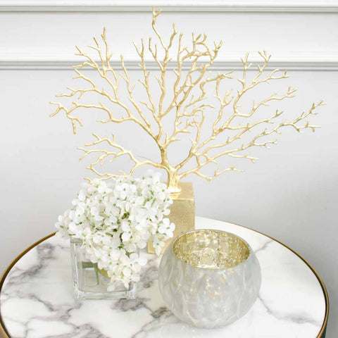 La Prosperite Brass Coral Reef Sculpture Decor is perfect for Modern Coffee Table Decor Ideas in a Timeless Luxury Home Design. 