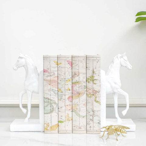Far white sculpture set of 2 Stallion bookends sits atop white base and features a timeless home design that is needing elegance and sophistication. 