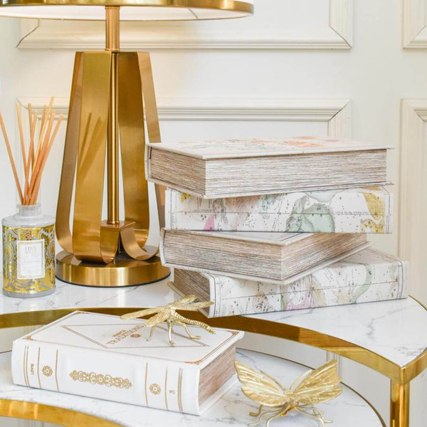 Book boxes are a smart and casual way of storing your keepsakes while being functional as a decor piece as well.