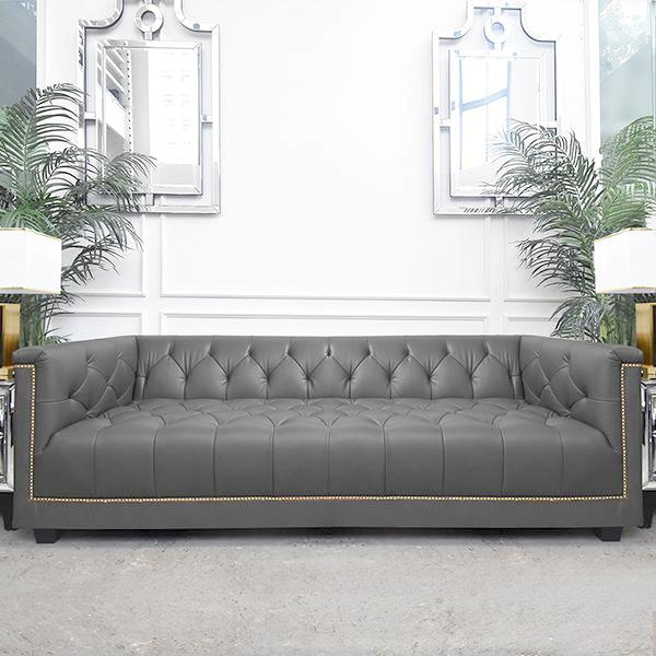 Our best selling Chesterfield Sofa is now in top grain Novillo calf leather from France. This modern vintage 3-seater settee is hand-tufted on its back rest and seat, built with solid hard birch wood frame, lined with nail head trim and with individual pocketed springs on seat cushion for contoured support and comfort.