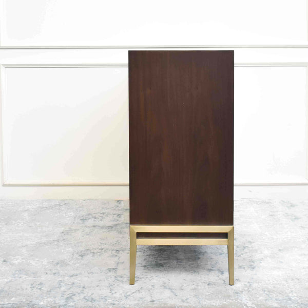 Side slim view of Harbour sideboard, with brushed gold stainless steel leg frames.