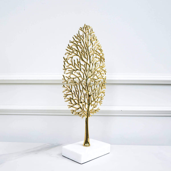 Coral-like tree sculpture with rectangular marble block base.