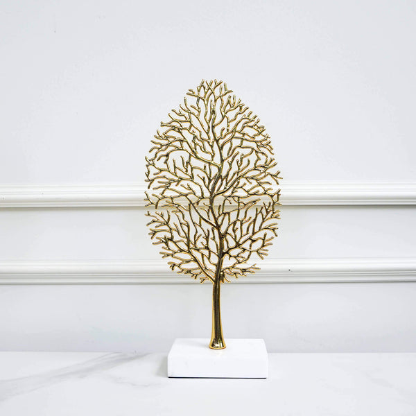 Gold tree branch details with marble base.