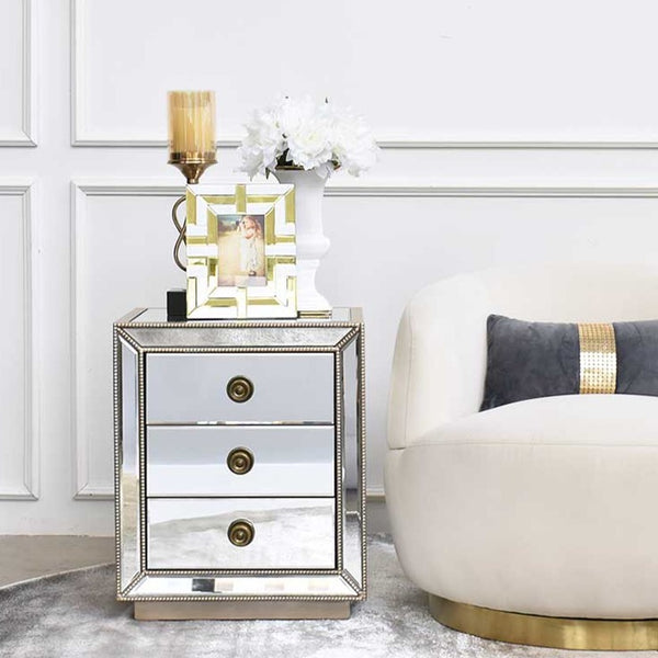 Mauro urn vase with decorative snow peony flowers and white gold themed living room.