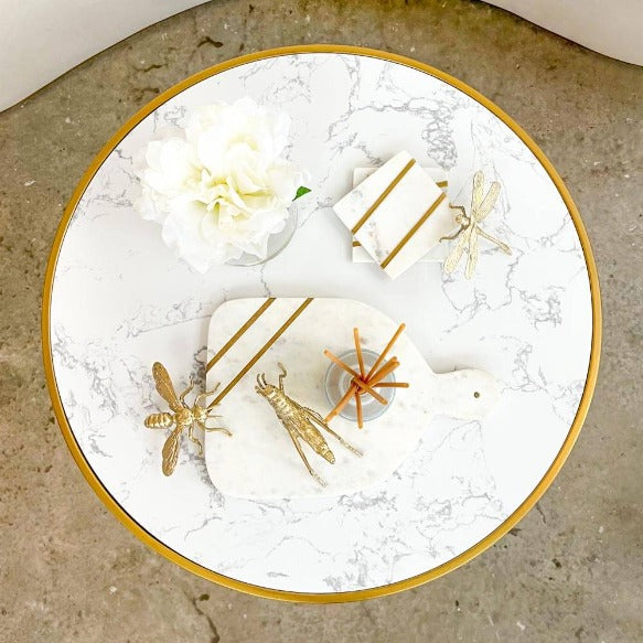 Marble coaster and cheese paddleboard, display on Hilltops marble coffee table.