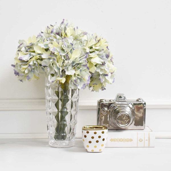 Coffee table decor ideas with Hydrangeas in a vase.