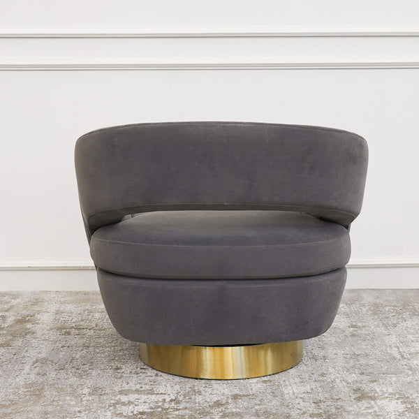 Back view of the Kelly armchair, Curved seats sitting atop a stainless steel brushed base.