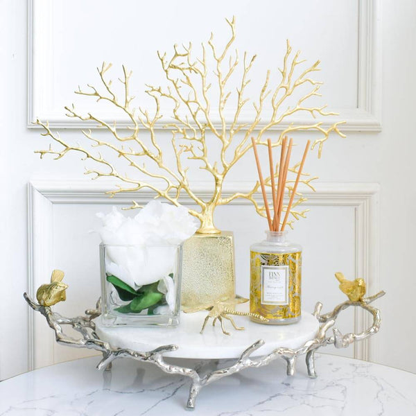 Place your decor pieces in a tray to create a versatile look.