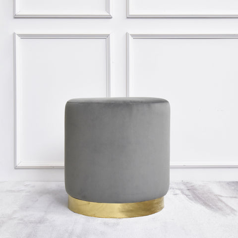 Lancelot Dresser Stool in a smooth grey velvet upholstery and Polished glossy gold finish at base foot. 