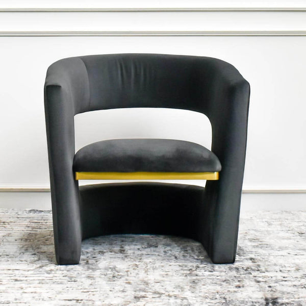 Front view of the Leedon Velvet Charcoal Grey Armchair, deep inner seating depth with higher back rest curved armrest.