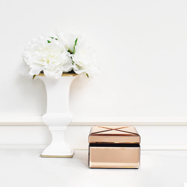 Front view of the Lucie trinket box, elegant mirrored rose gold.