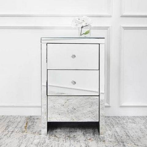 Contemporary and timeless, the Mireille mirrored nightstand stands out on its own. With 3 drawer compartment for more storage space.