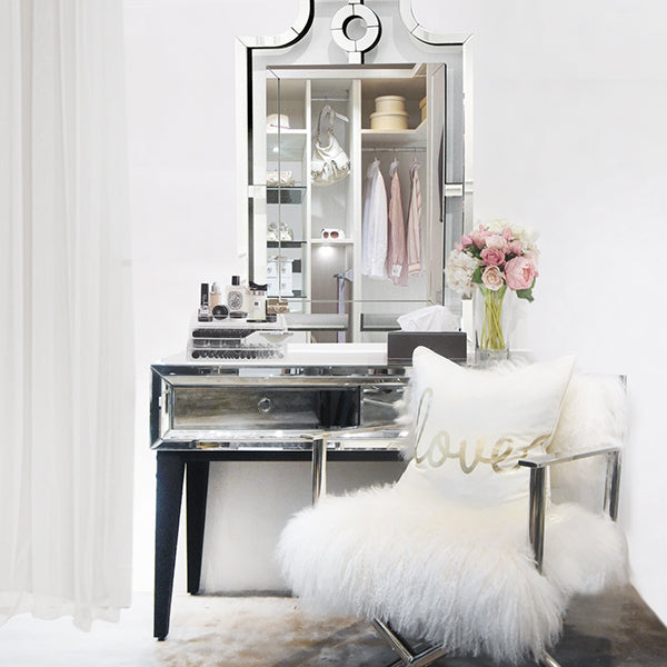 Etienne console as a mirrored vanity table, pair with a curve mirror for a sleek elegant look.
