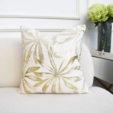 Inspired by the famous Majorelle Garden Retreat in Morocco, its intended distressed champagne gold print leaves design takes an unique modern take on this tropics-styled Art Deco cushion.