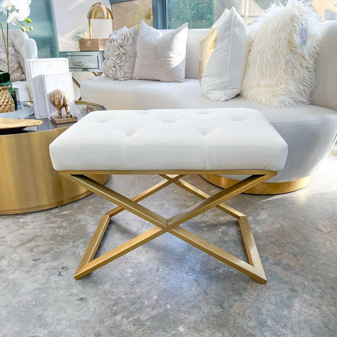 Inspired by the modern luxury interiors, Mon Jervois Cross Ottoman Stool is a must-have of-the-moment look. Its gold legs extend up onto the cushion for a glamorous touch of tufted design in lush velvet, delicately introducing instant style to any residential development.