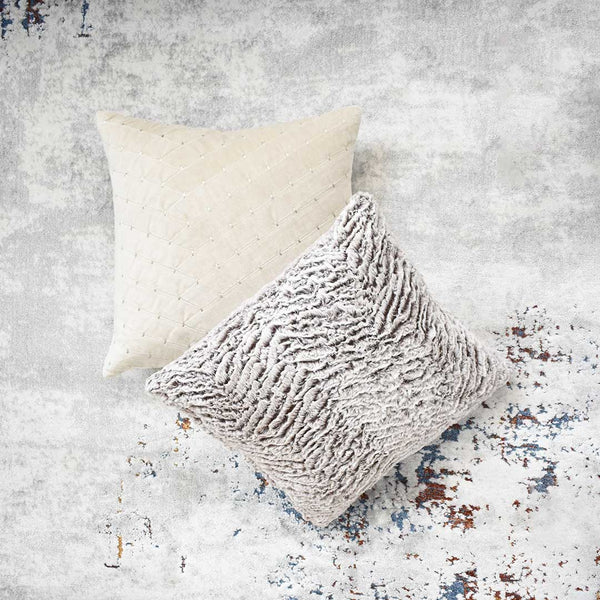 Montag faux fur and Paige throw cushions, layer this two together for a soft look.