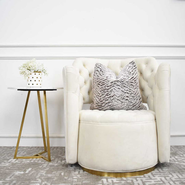 Aleta side table and Raphael Swivel Armchair for a Ivory and Gold theme, Style the look with decors and cushions.