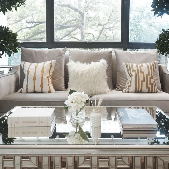 Designer furniture in white grey and beige living room home design on display in Singapore luxury furniture store.